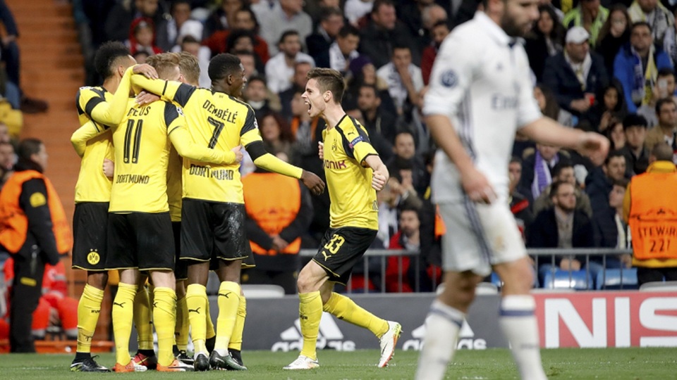 Hráči Borusie Dortmund a jejich radost při vstřeleném gólu.