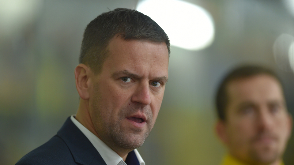 Trenér Karel Mlejnek. 